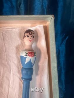 1920s Powder Puff Accessory. Rare carved Flapper Girl on an elongated puff wand. hand painted with original box and marketing insert
