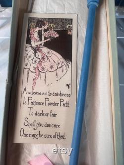 1920s Powder Puff Accessory. Rare carved Flapper Girl on an elongated puff wand. hand painted with original box and marketing insert