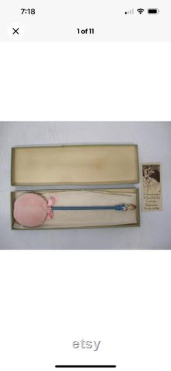 1920s Powder Puff Accessory. Rare carved Flapper Girl on an elongated puff wand. hand painted with original box and marketing insert