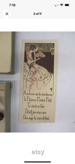 1920s Powder Puff Accessory. Rare carved Flapper Girl on an elongated puff wand. hand painted with original box and marketing insert