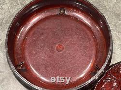 AVON CAMEO BOX Lucite Dark Red Oval Cameo Raised Scroll Design Jewelry Trinket Box Round Dusting Powder Box 1970s 586