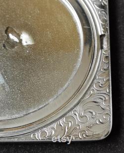 A Very Pretty Vintage Silver Plated Powder Compact By Elldee. Vintage French Silver Plated Powder Compact, Floral Decoration, By Elldee.