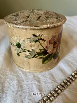 A papier mache powder box and puff, flowers, floral, pink, swan down powder puff.