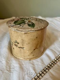 A papier mache powder box and puff, flowers, floral, pink, swan down powder puff.