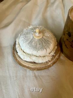 A papier mache powder box and puff, flowers, floral, pink, swan down powder puff.