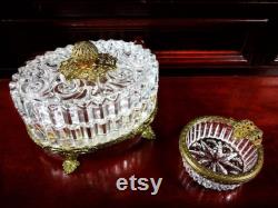 A set of Hollywood Regency style powder box and lady's ashtray. Antique footed filigree powder box decorated with acanthus leaves. 1920-1950