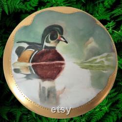 Antique Limoges Porcelain Round Trinket Keepsake Dresser Box Hand Painted Wood Duck Floating on a Pond with Gilt Trim Made in France