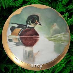 Antique Limoges Porcelain Round Trinket Keepsake Dresser Box Hand Painted Wood Duck Floating on a Pond with Gilt Trim Made in France