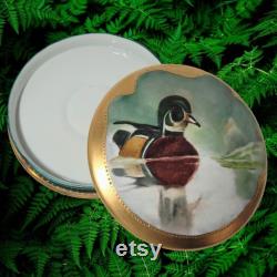 Antique Limoges Porcelain Round Trinket Keepsake Dresser Box Hand Painted Wood Duck Floating on a Pond with Gilt Trim Made in France