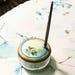 Antique art deco vanity powder jar with brass handled mirror lid