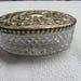 Antique cut crystal and brass toiletries bottle with Green Man, birds etc repousse top. c1905. Dressing table decor Ref AV