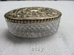 Antique cut crystal and brass toiletries bottle with Green Man, birds etc repousse top. c1905. Dressing table decor Ref AV