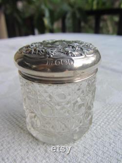 Antique cut glass and sterling silver toiletries bottle with repousse top. Sheffield 1912. Dressing table decor