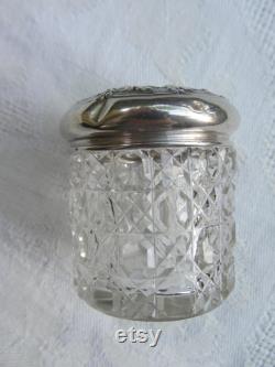 Antique cut glass and sterling silver toiletries bottle with repousse top. Sheffield 1912. Dressing table decor
