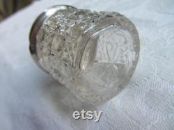 Antique cut glass and sterling silver toiletries bottle with repousse top. Sheffield 1912. Dressing table decor