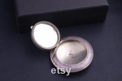 Antique silver compact or pendant with a mirror. Russian silver 84 zolotniks. Purple guilloche enamel. Russian Empire.