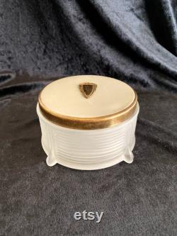 Art Deco satin glass powder box with enamel and brass lid