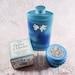 Avon Rapture Perfumed Talc and Gather a Garden Sachet