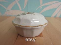 Cute vintage gilt edged porcelain powder jar with two dogs transfer detail