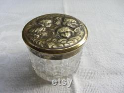 Large antique glass and brass toiletries bottle with Reynolds Angels repousse top. c1905. Dressing table decor Ref AP