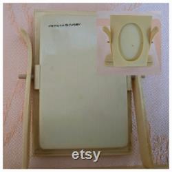 Lot of vintage French Ivory dressing table items 3 different lidded powder or trinket boxes, 2.5 1.5 swinging picture frame, 9.5 hairbrush