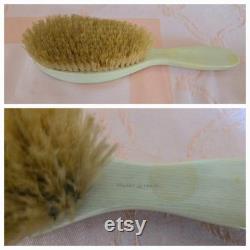 Lot of vintage French Ivory dressing table items 3 different lidded powder or trinket boxes, 2.5 1.5 swinging picture frame, 9.5 hairbrush