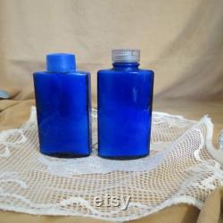 SALE Pair Vintage Evening In Paris Talcum Powder Bottles Talc Bottles With Contents Boujois Made In USA Cobalt Blue Glass Bottles