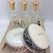 Two Vintage Madam Rochas Dusting Powder Bowls with Original puffs and 3 Perfume bottles