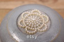 Vintage Aluminum Musical Powder Puff Box with Faux Pearl Design on the Lid