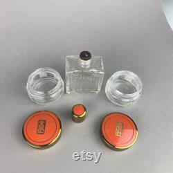 Vintage Art Deco Vanity Jars and Bottle with Orange Celluloid Lids Set of 3 Glass 1930s