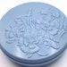 Vintage, Art Deco, plastic, powder box with floral decoration.