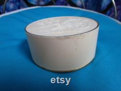 Vintage Avon Round Talc Power Container Hard Plastic Lid with floral design on it