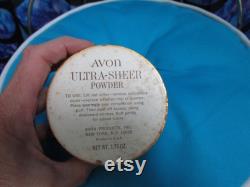 Vintage Avon Round Talc Power Container Hard Plastic Lid with floral design on it