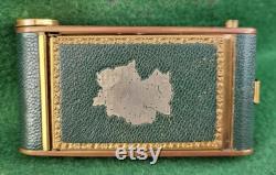Vintage Camera Type All In One Powder Compact With Lipstick Holder And Cigarette Compartment Showing Map Of USA Occupied Germany To Front.