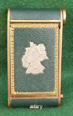 Vintage Camera Type All In One Powder Compact With Lipstick Holder And Cigarette Compartment Showing Map Of USA Occupied Germany To Front.