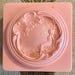 Vintage Evyan Pink Bakelite Screw Top Lid Powder Box w Carved Pastoral Scene