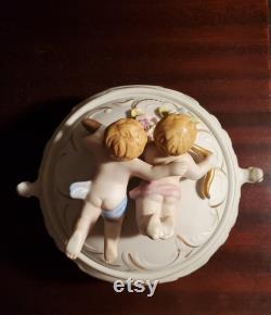 Vintage Footed Bisque Powder Box with Cherubs