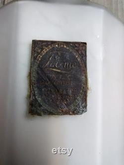 Vintage Melba Lov Me powder bottle please look at wear on label
