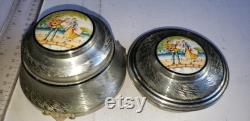 Vintage Metal powder puff holder and powder jar man and woman on top excellent condition