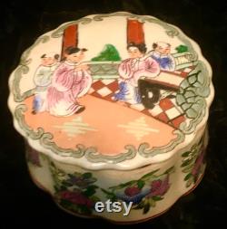 Vintage Porcelain Trinket Box Hand Painted in Macau with Asian Figures on Lid and Multi Colored, Raised, Floral Base.