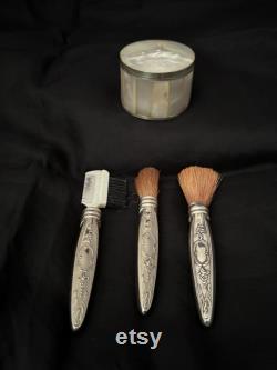 Vintage Powderbox with powder puff, 1 Brush marked Towle Sterling, 1 brush silver handle , 1 eyebrow comb with silver handle