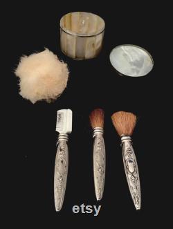 Vintage Powderbox with powder puff, 1 Brush marked Towle Sterling, 1 brush silver handle , 1 eyebrow comb with silver handle