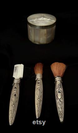 Vintage Powderbox with powder puff, 1 Brush marked Towle Sterling, 1 brush silver handle , 1 eyebrow comb with silver handle