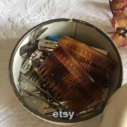 Vintage Ransburg Metal Powder Box with Hair Clips, Bobby Pins, Barette and Two Celluloid Combs. Great Trinket Collector Box for Dresser.