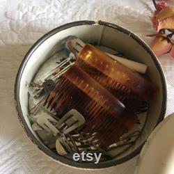 Vintage Ransburg Metal Powder Box with Hair Clips, Bobby Pins, Barette and Two Celluloid Combs. Great Trinket Collector Box for Dresser.