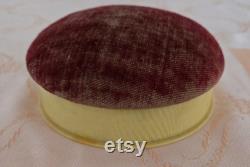 Vintage ivory coloured celluloid lidded powder bowl, maroon padded lid, vanity accessory, no puff included 4.5 W 1 D 4.75 base, lid 1.25 H