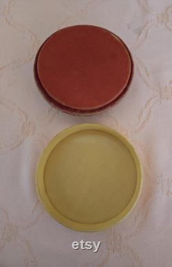 Vintage ivory coloured celluloid lidded powder bowl, maroon padded lid, vanity accessory, no puff included 4.5 W 1 D 4.75 base, lid 1.25 H