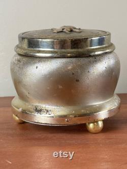 Vintage, metal, 3 footed, musical powder box with mirror inside the lid