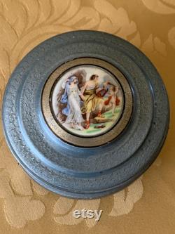 Vintage metal musical powder box, blue gray aluminum vanity trinket jewelry storage, robed couple and cherub porcelain cabochon