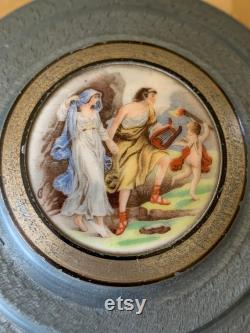 Vintage metal musical powder box, blue gray aluminum vanity trinket jewelry storage, robed couple and cherub porcelain cabochon